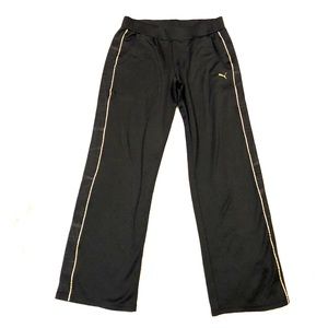 Puma black and gold joggers